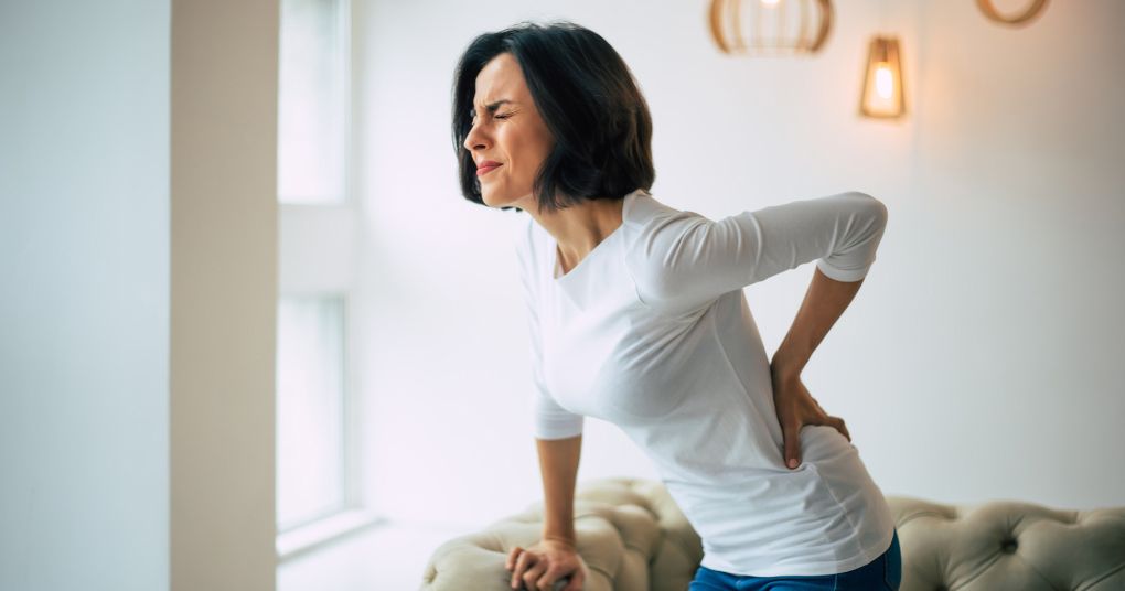 how can stiff and tight muscles result in back pain
